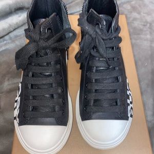 Burberry Chucks w/ side zipper. Gently worn